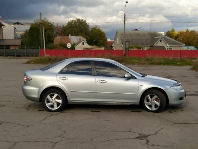 Серый Мазда 6, объемом двигателя 2 л и пробегом 400 тыс. км за 3300 $, фото 2 на Automoto.ua