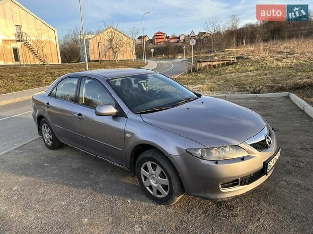 Серый Мазда 6, объемом двигателя 2 л и пробегом 276 тыс. км за 4500 $, фото 1 на Automoto.ua