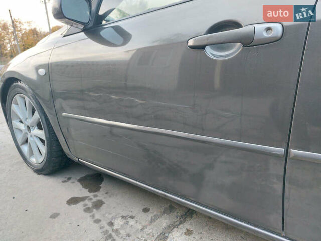 Сірий Мазда 6, об'ємом двигуна 2.3 л та пробігом 260 тис. км за 3900 $, фото 9 на Automoto.ua