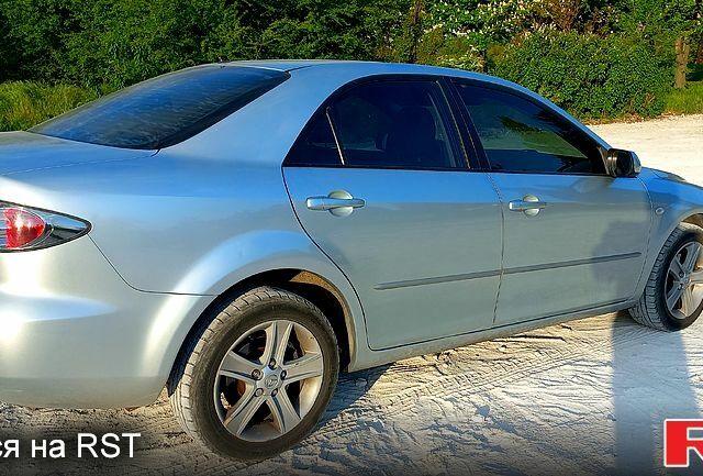 Серый Мазда 6, объемом двигателя 2 л и пробегом 187 тыс. км за 5500 $, фото 2 на Automoto.ua