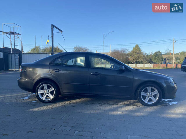 Сірий Мазда 6, об'ємом двигуна 2 л та пробігом 229 тис. км за 4600 $, фото 5 на Automoto.ua