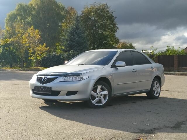 Серый Мазда 6, объемом двигателя 2 л и пробегом 400 тыс. км за 3300 $, фото 1 на Automoto.ua