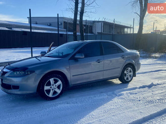 Сірий Мазда 6, об'ємом двигуна 2 л та пробігом 234 тис. км за 6000 $, фото 1 на Automoto.ua