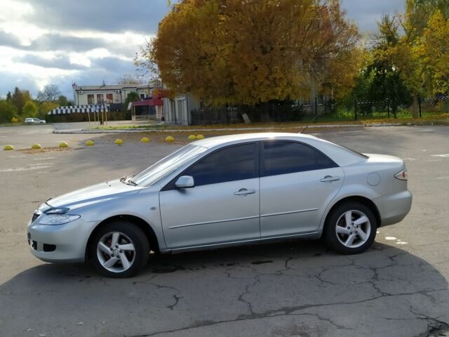 Серый Мазда 6, объемом двигателя 2 л и пробегом 400 тыс. км за 3300 $, фото 4 на Automoto.ua