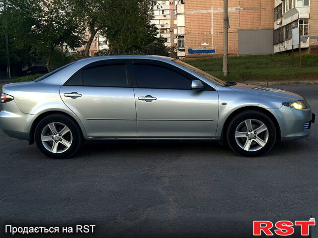 Серый Мазда 6, объемом двигателя 2 л и пробегом 296 тыс. км за 4500 $, фото 6 на Automoto.ua