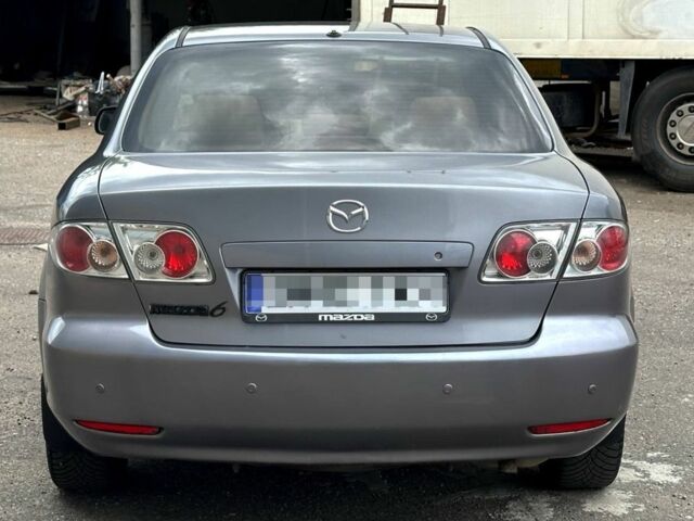 Серый Мазда 6, объемом двигателя 2 л и пробегом 250 тыс. км за 2450 $, фото 4 на Automoto.ua