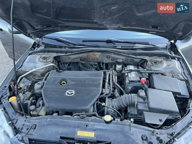 Мазда 6 2006 у Каменце-Подольском на Automoto.ua Сірий Мазда 6, об'ємом двигуна 2 л та пробігом 310 тис. км за 4300 $, фото 13 на Automoto.ua