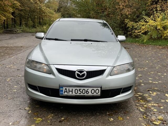 Серый Мазда 6, объемом двигателя 2 л и пробегом 245 тыс. км за 4599 $, фото 1 на Automoto.ua