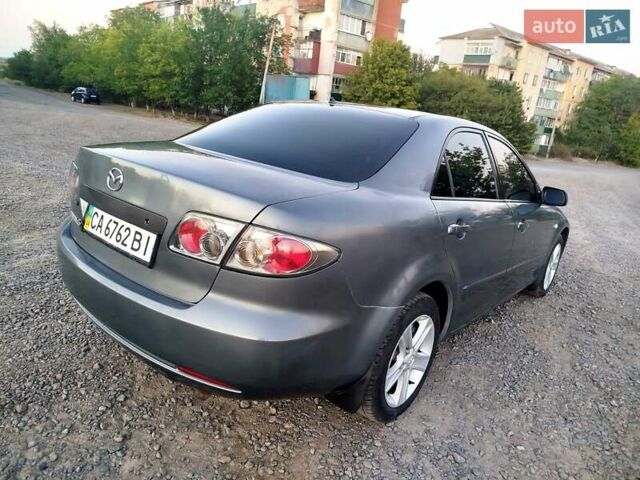 Сірий Мазда 6, об'ємом двигуна 2 л та пробігом 202 тис. км за 4000 $, фото 23 на Automoto.ua