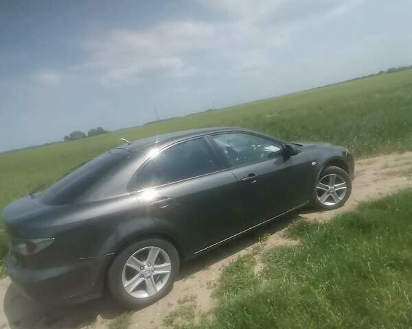 Серый Мазда 6, объемом двигателя 2 л и пробегом 340 тыс. км за 5000 $, фото 2 на Automoto.ua