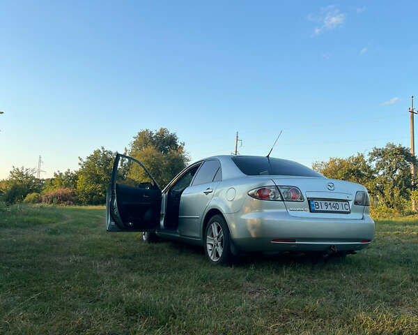 Серый Мазда 6, объемом двигателя 2 л и пробегом 343 тыс. км за 4900 $, фото 2 на Automoto.ua