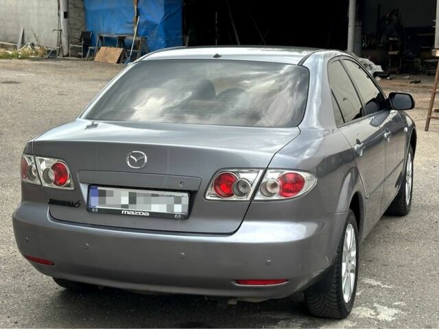 Серый Мазда 6, объемом двигателя 2 л и пробегом 250 тыс. км за 2450 $, фото 2 на Automoto.ua