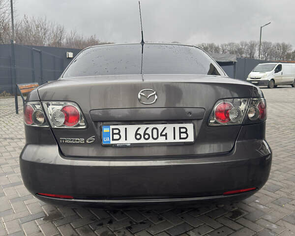 Серый Мазда 6, объемом двигателя 2 л и пробегом 160 тыс. км за 5200 $, фото 3 на Automoto.ua