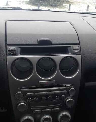 Серый Мазда 6, объемом двигателя 2 л и пробегом 254 тыс. км за 5500 $, фото 1 на Automoto.ua