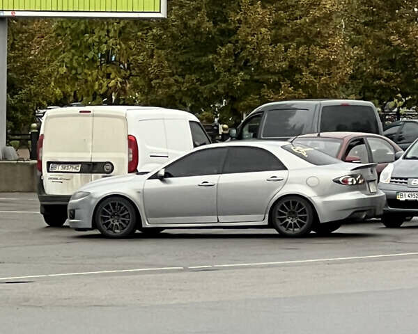 Сірий Мазда 6, об'ємом двигуна 2.3 л та пробігом 200 тис. км за 6900 $, фото 7 на Automoto.ua