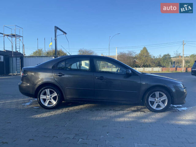 Сірий Мазда 6, об'ємом двигуна 2 л та пробігом 229 тис. км за 4600 $, фото 4 на Automoto.ua