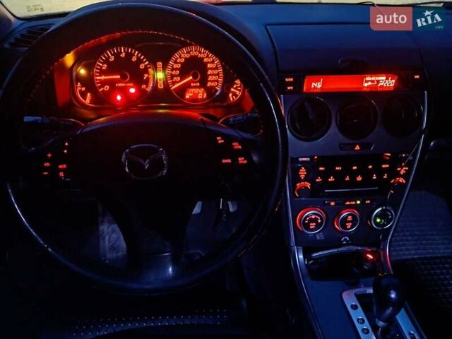 Серый Мазда 6, объемом двигателя 2 л и пробегом 170 тыс. км за 5350 $, фото 66 на Automoto.ua