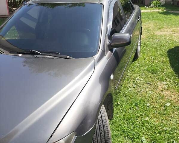 Серый Мазда 6, объемом двигателя 2 л и пробегом 328 тыс. км за 4000 $, фото 3 на Automoto.ua