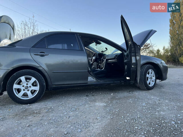 Мазда 6 2006 у Каменце-Подольском на Automoto.ua Сірий Мазда 6, об'ємом двигуна 2 л та пробігом 310 тис. км за 4300 $, фото 12 на Automoto.ua