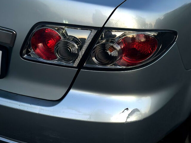 Серый Мазда 6, объемом двигателя 2 л и пробегом 296 тыс. км за 4500 $, фото 4 на Automoto.ua