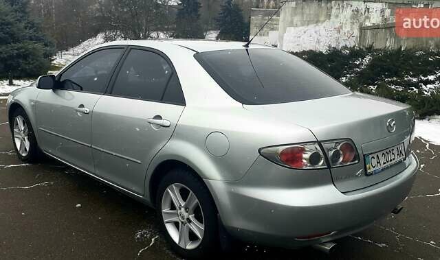 Серый Мазда 6, объемом двигателя 2 л и пробегом 254 тыс. км за 5500 $, фото 9 на Automoto.ua