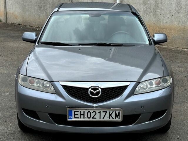 Серый Мазда 6, объемом двигателя 2 л и пробегом 280 тыс. км за 1850 $, фото 4 на Automoto.ua