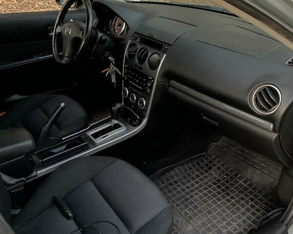 Серый Мазда 6, объемом двигателя 2 л и пробегом 278 тыс. км за 4300 $, фото 9 на Automoto.ua