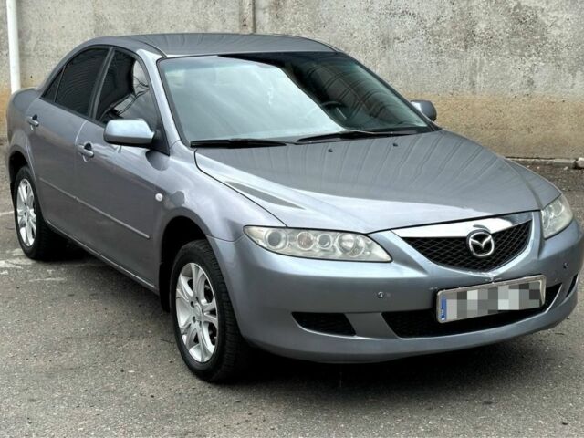 Серый Мазда 6, объемом двигателя 2 л и пробегом 250 тыс. км за 2450 $, фото 1 на Automoto.ua