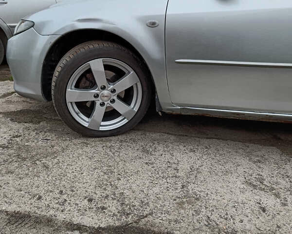 Серый Мазда 6, объемом двигателя 2 л и пробегом 480 тыс. км за 3500 $, фото 4 на Automoto.ua
