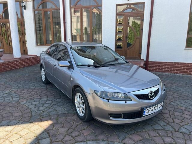 Серый Мазда 6, объемом двигателя 2 л и пробегом 240 тыс. км за 3900 $, фото 2 на Automoto.ua