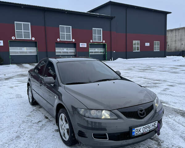 Серый Мазда 6, объемом двигателя 2 л и пробегом 318 тыс. км за 5500 $, фото 2 на Automoto.ua