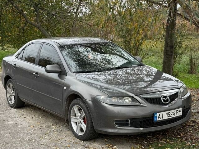 Сірий Мазда 6, об'ємом двигуна 2 л та пробігом 377 тис. км за 3599 $, фото 2 на Automoto.ua