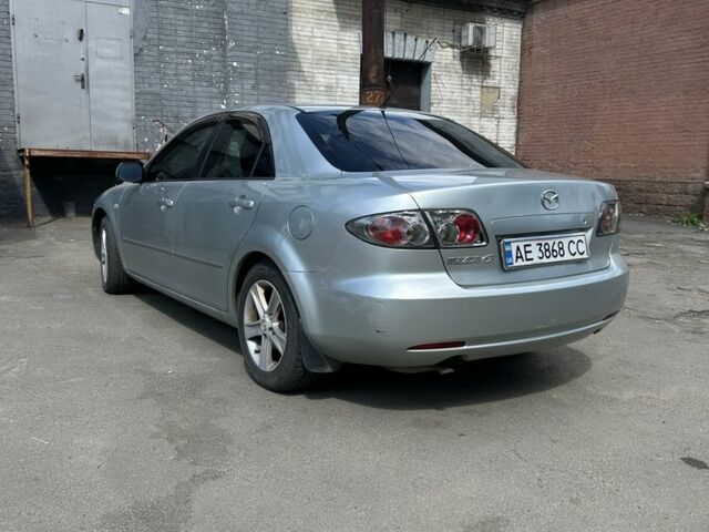 Серый Мазда 6, объемом двигателя 2 л и пробегом 295 тыс. км за 4000 $, фото 1 на Automoto.ua