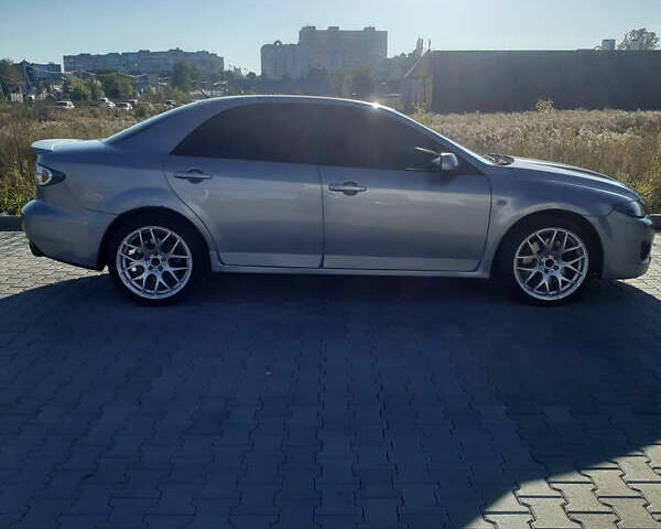 Сірий Мазда 6, об'ємом двигуна 2.3 л та пробігом 228 тис. км за 5800 $, фото 5 на Automoto.ua