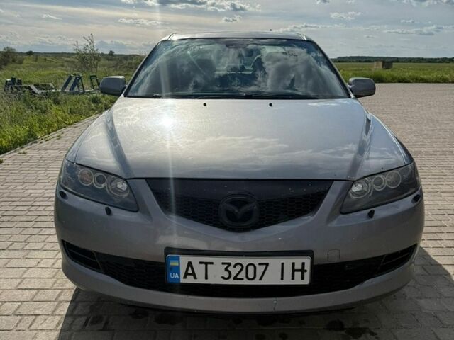 Серый Мазда 6, объемом двигателя 2 л и пробегом 413 тыс. км за 3300 $, фото 10 на Automoto.ua