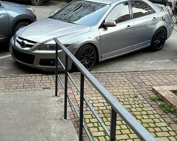 Сірий Мазда 6, об'ємом двигуна 2.3 л та пробігом 200 тис. км за 6900 $, фото 4 на Automoto.ua