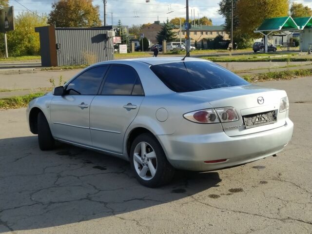 Серый Мазда 6, объемом двигателя 2 л и пробегом 400 тыс. км за 3300 $, фото 5 на Automoto.ua