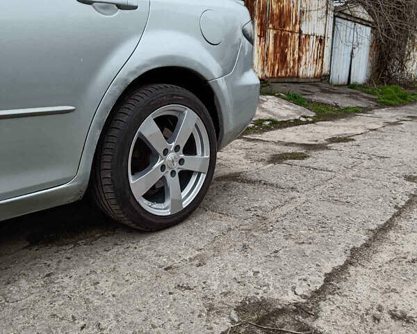 Серый Мазда 6, объемом двигателя 2 л и пробегом 480 тыс. км за 3500 $, фото 6 на Automoto.ua