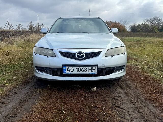 Серый Мазда 6, объемом двигателя 2 л и пробегом 208 тыс. км за 4200 $, фото 1 на Automoto.ua
