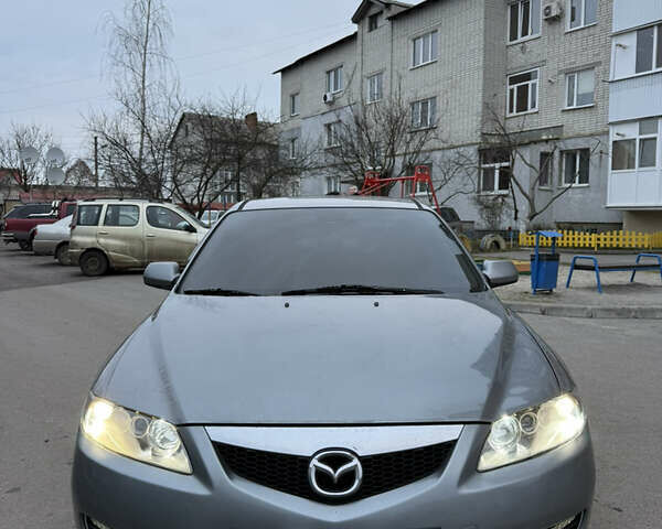 Серый Мазда 6, объемом двигателя 2 л и пробегом 323 тыс. км за 4750 $, фото 2 на Automoto.ua
