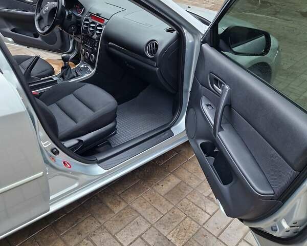 Серый Мазда 6, объемом двигателя 2 л и пробегом 201 тыс. км за 6300 $, фото 8 на Automoto.ua