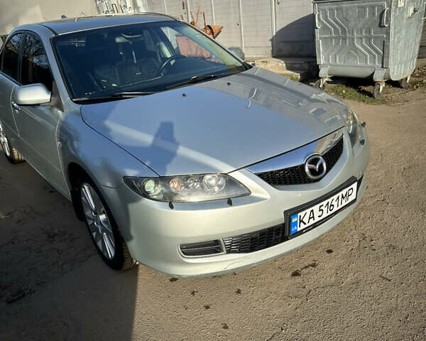 Серый Мазда 6, объемом двигателя 2 л и пробегом 244 тыс. км за 4600 $, фото 2 на Automoto.ua