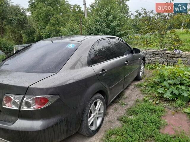 Сірий Мазда 6, об'ємом двигуна 2 л та пробігом 415 тис. км за 4500 $, фото 1 на Automoto.ua
