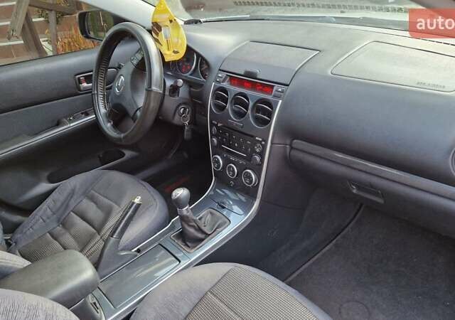 Сірий Мазда 6, об'ємом двигуна 1.8 л та пробігом 253 тис. км за 5400 $, фото 3 на Automoto.ua