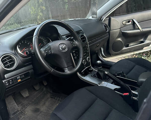 Серый Мазда 6, объемом двигателя 1.8 л и пробегом 235 тыс. км за 4400 $, фото 1 на Automoto.ua
