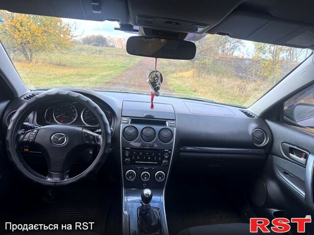 Серый Мазда 6, объемом двигателя 2 л и пробегом 208 тыс. км за 4200 $, фото 11 на Automoto.ua