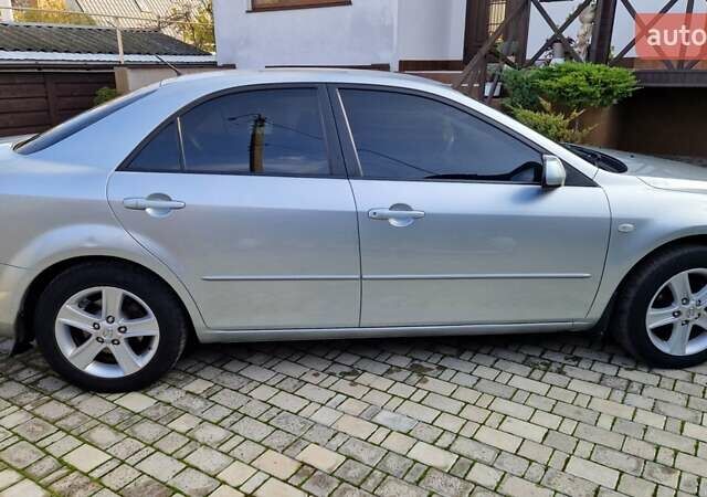 Сірий Мазда 6, об'ємом двигуна 1.8 л та пробігом 253 тис. км за 5400 $, фото 7 на Automoto.ua