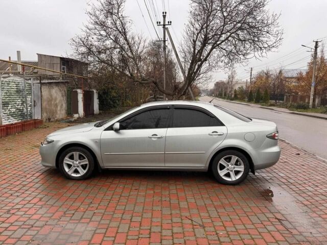 Серый Мазда 6, объемом двигателя 2 л и пробегом 171 тыс. км за 5700 $, фото 1 на Automoto.ua