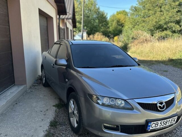 Серый Мазда 6, объемом двигателя 2 л и пробегом 321 тыс. км за 4770 $, фото 1 на Automoto.ua