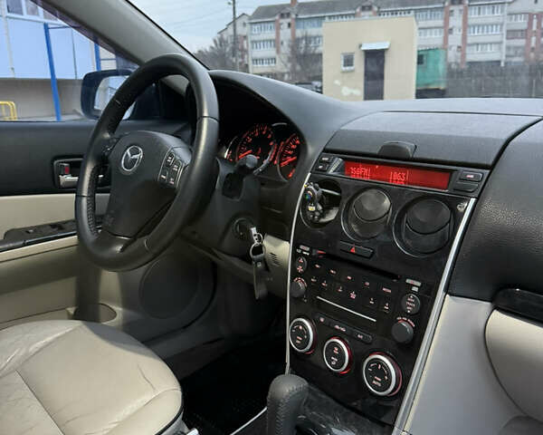 Серый Мазда 6, объемом двигателя 2 л и пробегом 323 тыс. км за 4750 $, фото 19 на Automoto.ua